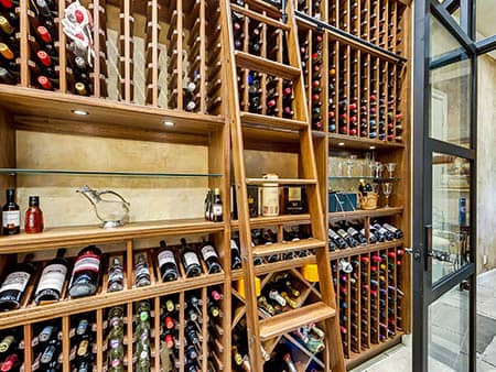 Custom Wine Cellar - Glass Doors with Sculpture