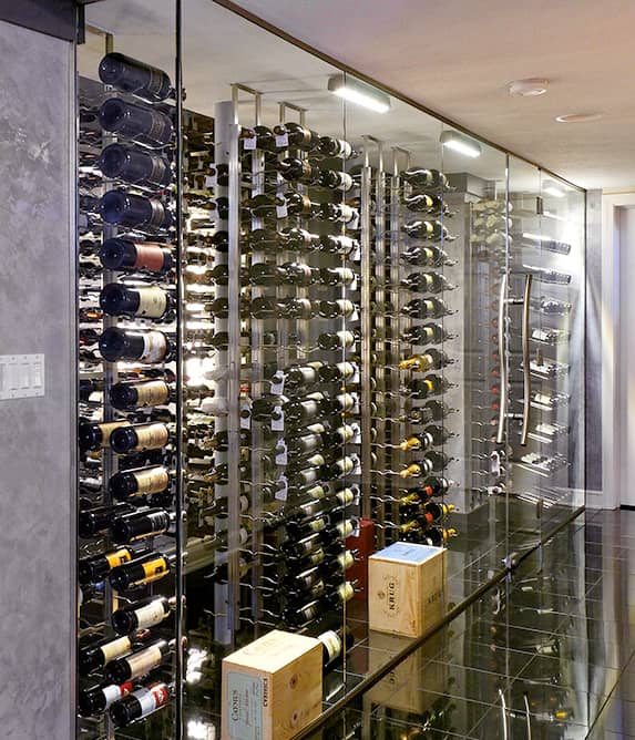 Hallway with a wine cellar on one side.