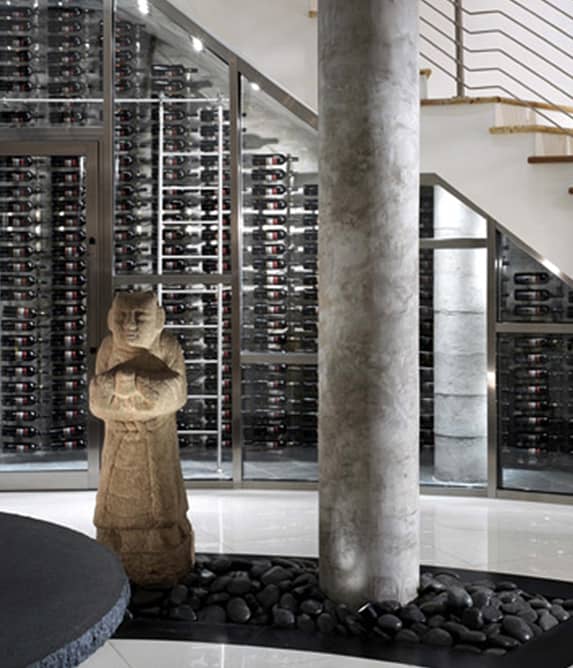 Metal wine racks in an elegant, minimalist metal wine cellar.